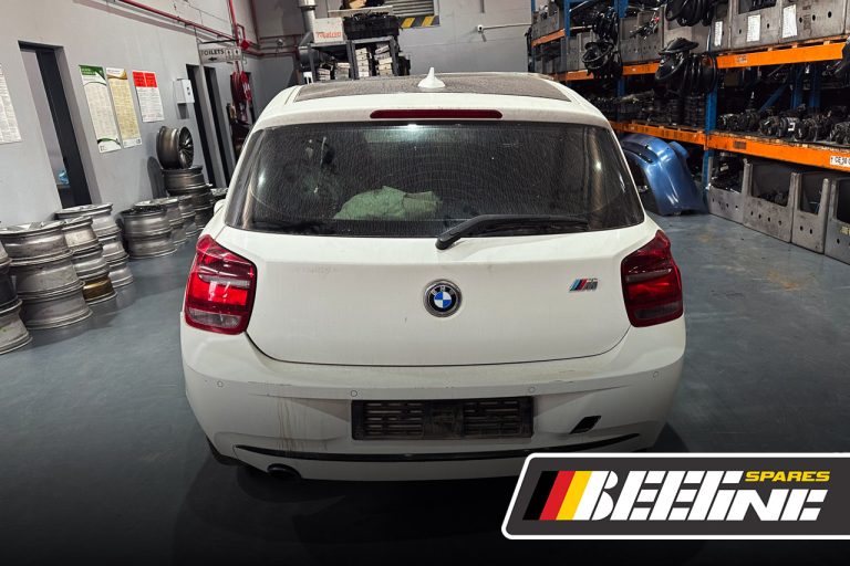 BMW 1 Series F20 118i Stripping for used spare parts front back view